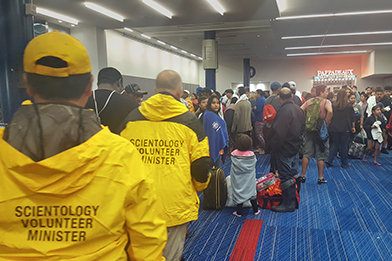 Volunteer Ministers arrive to an emergency shelter set up in the Houston Convention Center.