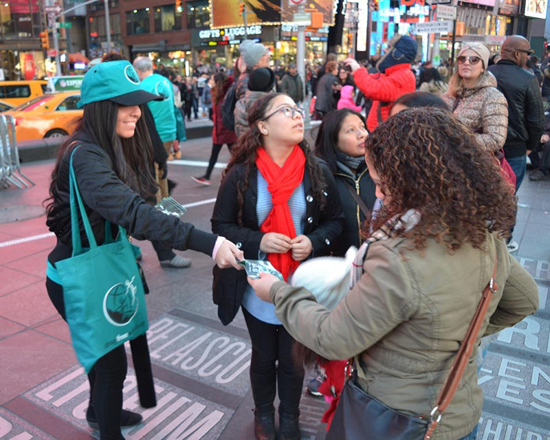 Drug-Free World volunteers hand out Truth About Drugs booklets in Times Square.