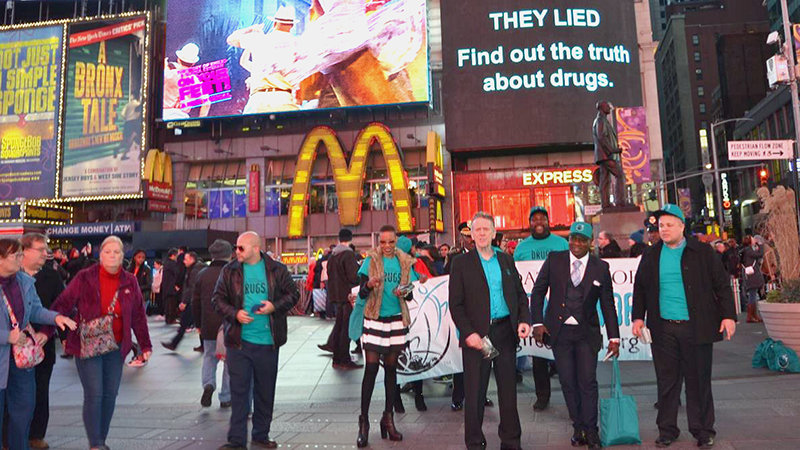 Drug-Free World volunteers hand out Truth About Drugs booklets in Times Square.